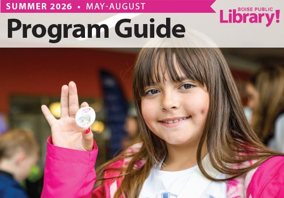 Cover of 2026 Program Guide - a girl smiling while holding an art project.